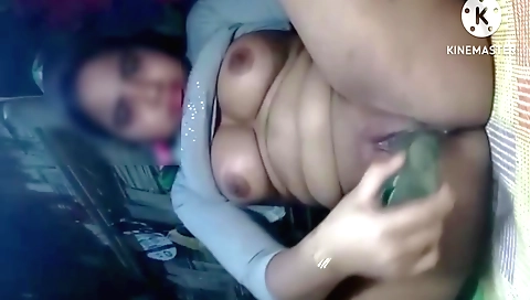 Indian brunette with small tits masturbates in bed