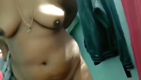 Indian babe gives herself a hot massage in a luxurious room