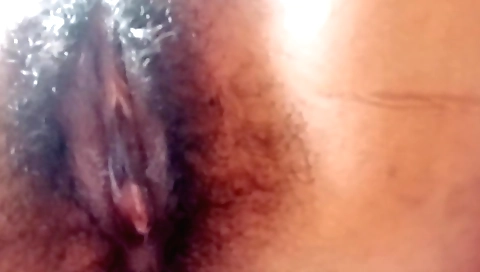 Indian chick shows her hairy pussy in amateur solo video