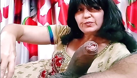 A mature brunette is deepthroated and she is sucking a dick