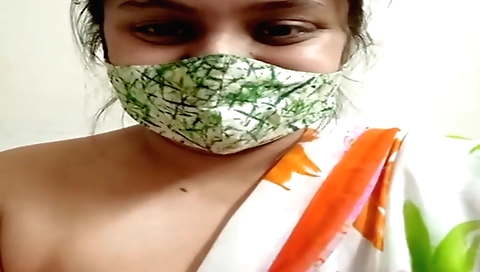 Indian teen with a nice set of big tits is fingering