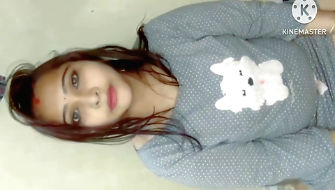 Amateur brunette in a sexy dress gives a sexy handjob