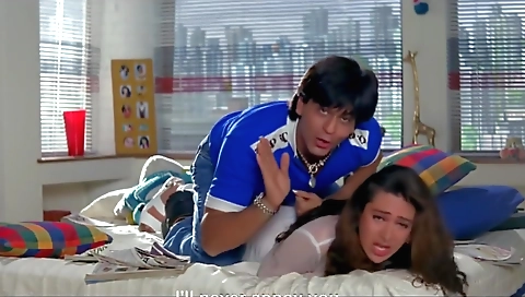 A sexy brunette is wearing a sexy bra and dress in the form of a bra