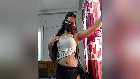 Sexy brunette girl looks sexy and enjoys showing off