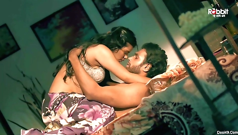 Brightly dressed brunette maid is showing off her sexy body