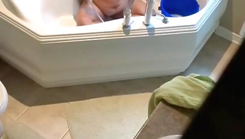 Indian milf is getting naked and naked in a shower