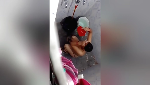 Busty brunette chick takes a shower and masturbates