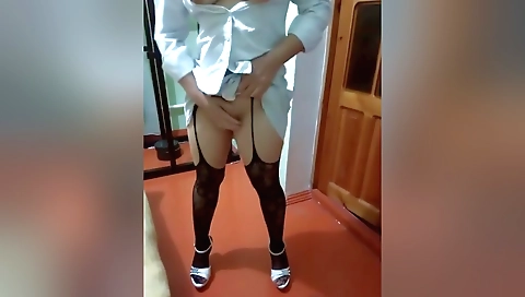 Indian wife is standing back in a strange position in a stockings vid