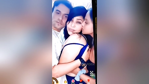 Amateur brunette is giving a hot blowjob to two guys