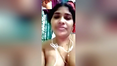 Indian brunette babe with big boobs showing off her tits