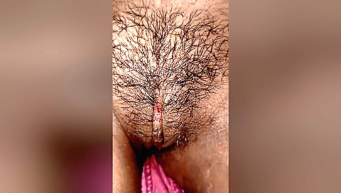 Sexy hairy indian girl is playing with her hairy hair