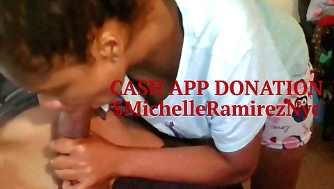 Indian brunette in a dress is making love with a black guy