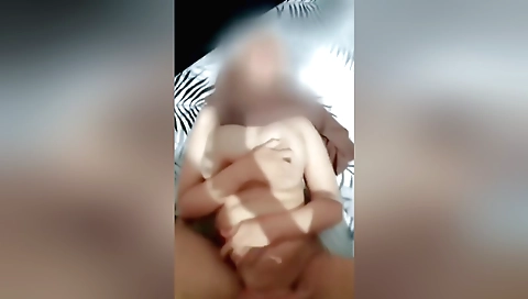 Big tits amateur brunette with a hot smile plays with her pussy