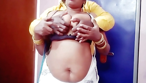 Brunette girl in red lingerie gives a blowjob to a client