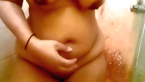 Chatty indian chick in her shower room showing off body