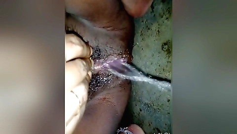 Horny indian woman is fucking herself in her pussy