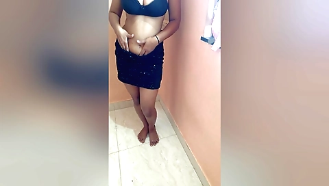 Indian girl in a dress dances with a hot bhojpuri harp