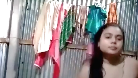 Indian shower video with naked brunette in the bathroom