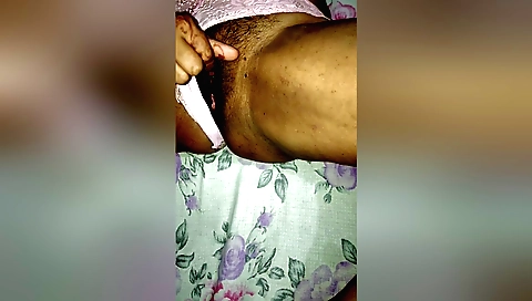 Hairy indian bhabhi is standing on a chair in her dress