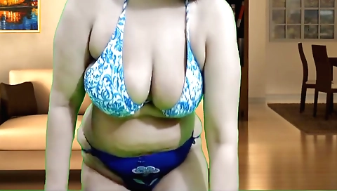 Indian beauty in a hijab shows off her sexy body and pussy