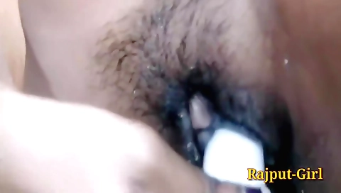 Indian girl is on bed and her hairy pussy is getting wet