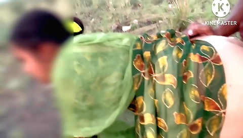 Indian brunette fucked by a big black dude in outdoor