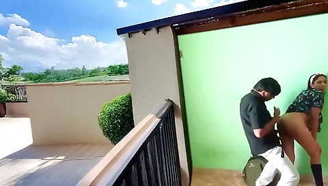 Indian slut on a big outdoor table rides a big white cock