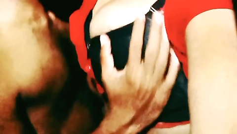 Amateur brunette with big tits showing off in a movie