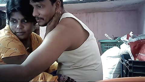 Amateur brunette is sitting on his lap in front of the web camera